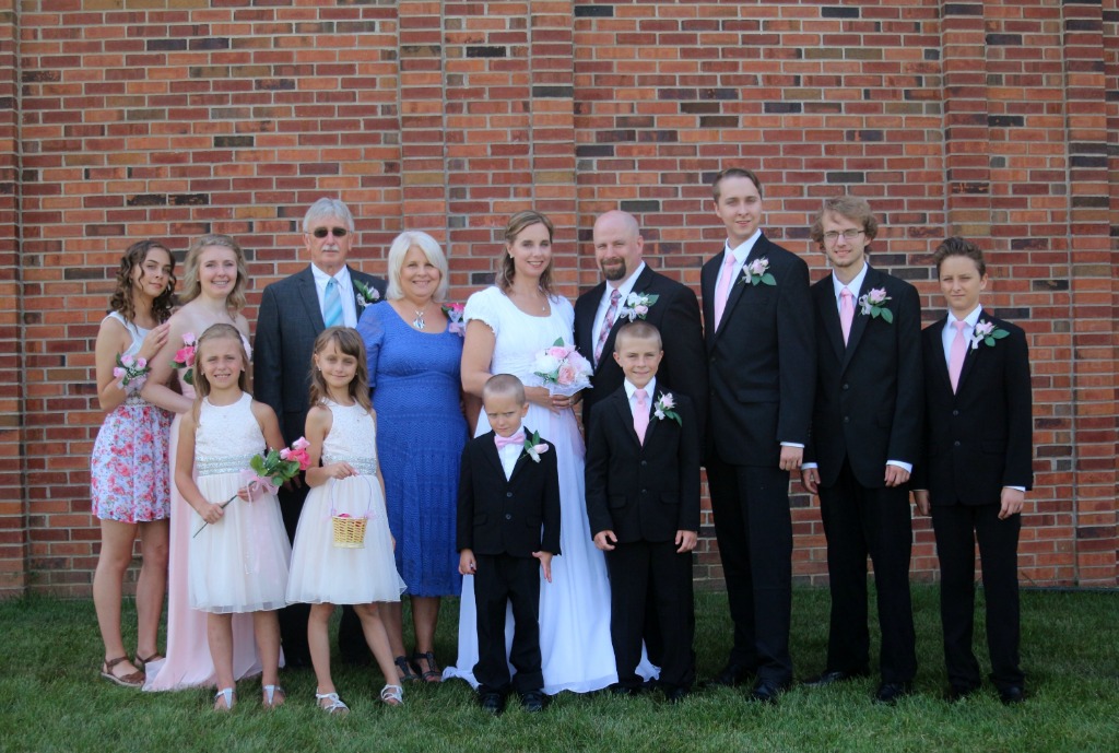 Family picture  Our 1st daughters Karis wedding July 2018. 9 grandkids